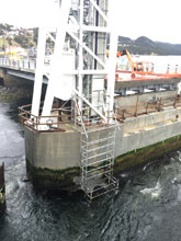 Cantilevered, Suspended Scaffold at Placentia Lift Bridge. (Under Construction)